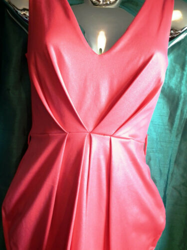 New coral stretchy,sexy,kneelength WEDDING/PROm puff hemdress .size10BUST 36" none