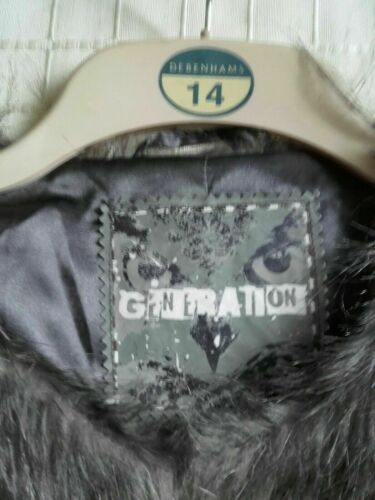 Faux Fur very Shaggy Jacket,owl feather style lined, gorgeus item.size8/10uk. Feather