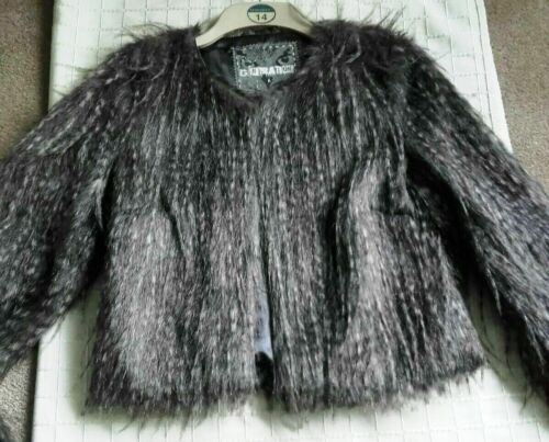 Faux Fur very Shaggy Jacket,owl feather style lined, gorgeus item.size8/10uk. Feather